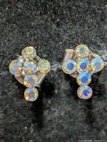 Front view of both earrings showing rhinestone cross design