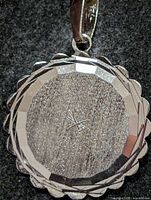 front view showing entire pendant, bail and texture
