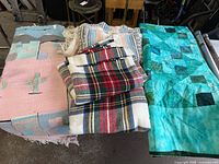 Group view of all four textiles on table