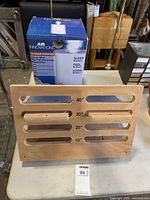 Front view of calf stretcher showing angle markings and humidifier box