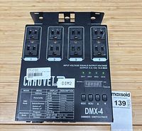 Front view showing eight outlets, control panel, branding and rating information