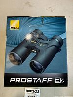 Front of Nikon ProStaff 3s box showing binocular image
