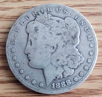 Obverse of 1888 Morgan dollar showing Liberty head and date
