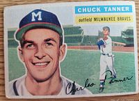 Front of 1956 Topps Chuck Tanner card showing portrait, action image and name banner