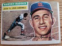 Front of 1956 Topps Harvey Haddix card showing portrait, action image, and signature