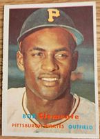 Front of 1957 Topps Roberto Clemente card showing color portrait and card title