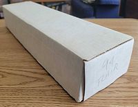 Closed white card storage box labeled "94 FLAIR" showing size and condition