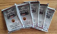 Five sealed Upper Deck 1992-93 NBA Basketball foil packs displayed side by side