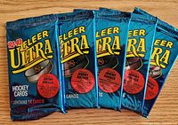 Five sealed 1992-93 Fleer Ultra hockey card packs displayed front side