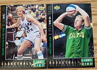 Front view of both Larry Bird Upper Deck Heroes cards numbers 19 and 24