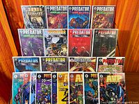 Full lot showing three rows of Predator and AVP comics, all bagged and boarded