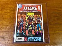 Front view of bagged Tales of the Teen Titans #44 comic