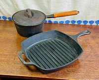 Both cast iron cookware pieces side by side