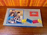 Top view of LEGO 705-2 flat box showing full artwork and stud pattern