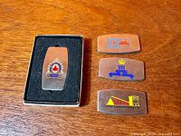 Four Zippo knives, one boxed, showing all logos