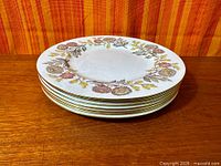 Stack of Wedgwood Lichfield dinner plates side view