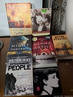 All seven books laid out showing covers