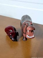 Front view of both hippopotamus figurines