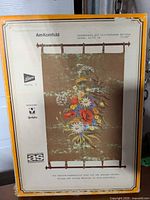 Box front showing design, brand AS, size 47 x 75 cm