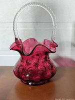 Full view of cranberry coin dot glass basket
