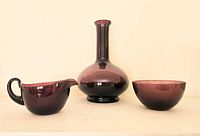 Front view of all three amethyst glass pieces