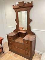 Full view of dresser showing drawers, mirror, shelf