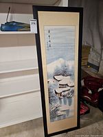 Full view of framed winter village artwork