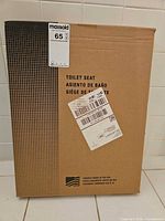 Front of sealed Bemis toilet seat carton with label