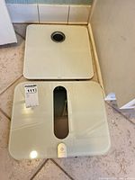 Top view of both white digital bathroom scales