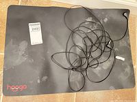 Top view of entire mat with cord and maxsold tag