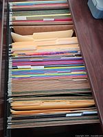 Drawer of assorted color and manila hanging file folders