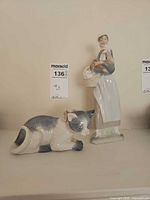 Front view of both figurines