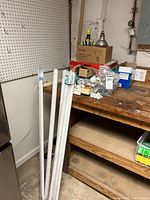 Overall lot on workbench with tubes, boxes, timers, trims