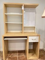 Full view of desk showing hutch shelves, keyboard tray closed, drawer and CPU bay