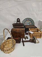 Group shot of all wood and wicker folk art items
