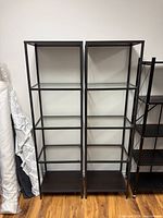 Front view showing both Vittsjo shelf units side by side
