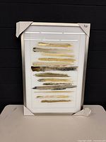 Front view showing full artwork, frame and protective corner covers