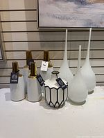 Group shot showing all eight vases