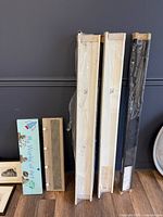 Overall lot with packaged IKEA shelves and two hook boards