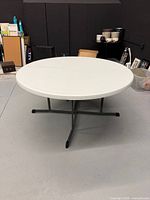 Round white Lifetime folding table fully assembled