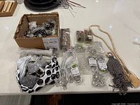 Countertop view showing all drapery rings, tiebacks, cords and hardware