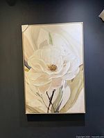 Front view of framed floral canvas print