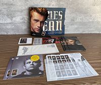 Overview of all James Dean collectibles laid out on tabletop