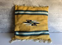 Front view showing woven design and stripes