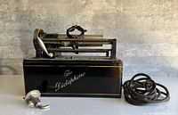 Front angle showing full Dictaphone machine on base