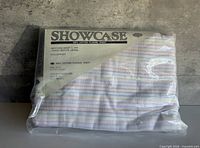 Front view of sealed Showcase cotton flannel twin fitted sheet package