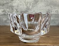 Front view of Orrefors Corona crystal bowl showing serrated rim and label