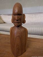 Front view of Besmo wood bust