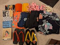 Overview of kimono robes, obi, cords, tenugui, sandals, art