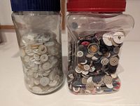 Both jars side by side showing contents and lids (blue and red)